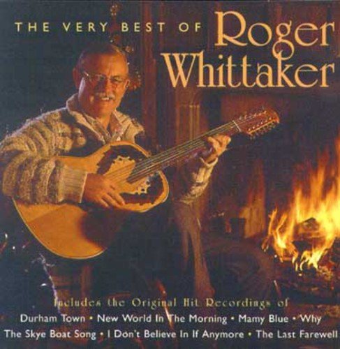 "CD cover featuring Roger Whittaker holding a guitar by a fireplace."