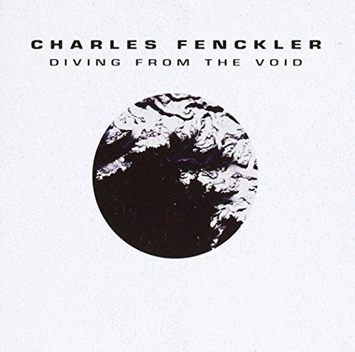 "Album cover with a black and white circular image on a white background."