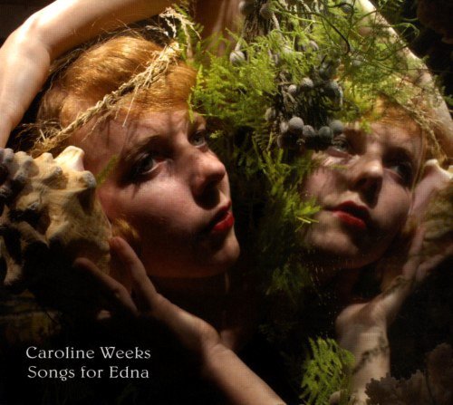 Album cover featuring a woman with plants and shells, mirrored effect.