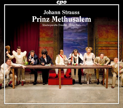 "CD cover showing actors in period costumes at a long table on stage."