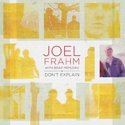 The image is a music album cover with a collage of yellow-tinted photos.
