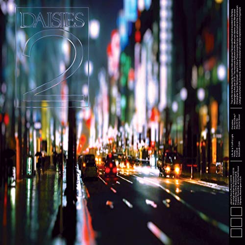 “Daisies - 2” vinyl cover: blurry city street at night, illuminated.