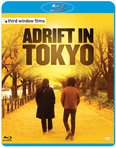 Adrift In Tokyo" Blu-ray cover: two figures walking down a tree-lined path.