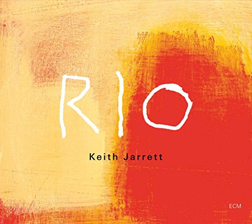 "Album cover with 'RIO' in white, yellow and red abstract background, by Keith Jarrett."