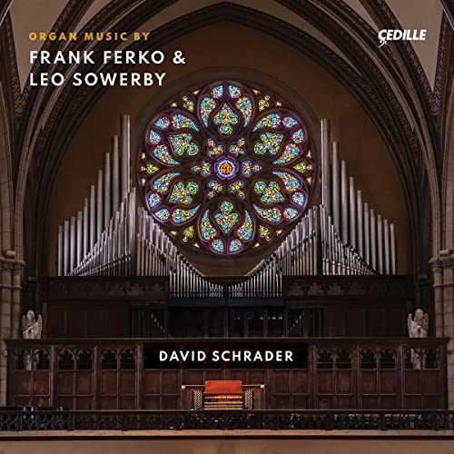 CD cover featuring a church organ and stained glass rose window.