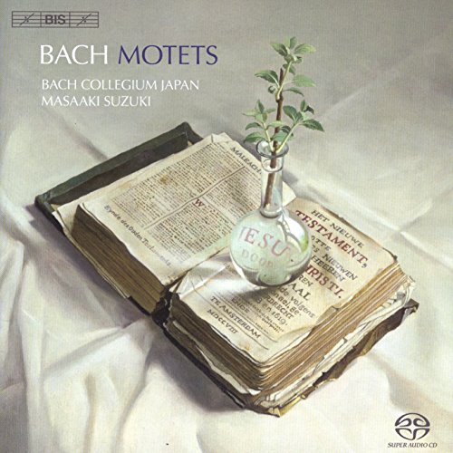 Bach Motets CD cover featuring a Bible with a small plant and vase.