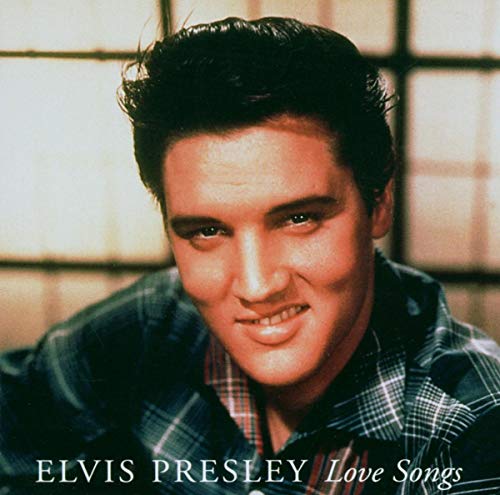 Close-up portrait of Elvis Presley wearing a plaid shirt on a CD cover.