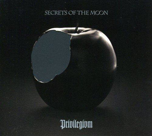 Dark album cover featuring a bitten, black apple with text.