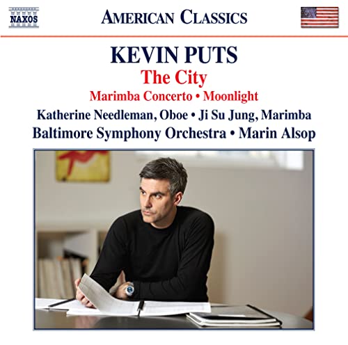 CD cover for “The City” by Kevin Puts, featuring a composer portrait.