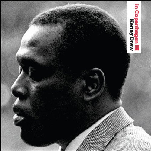 "Black and white album cover with a man's profile and red text."