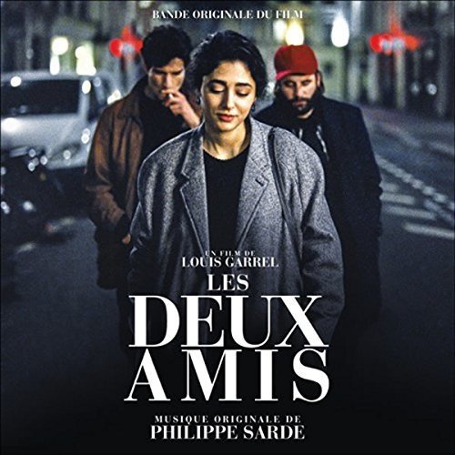 "CD cover featuring three men on a dark street at night."