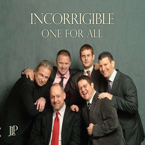 "Album cover featuring six men in suits posing together against a gray background."