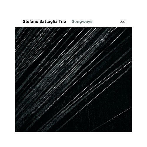 "Album cover with black background, white diagonal lines, and white header with text."