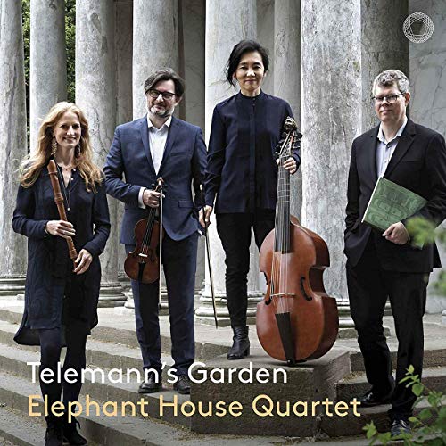 "CD cover featuring four musicians standing on steps with their instruments."