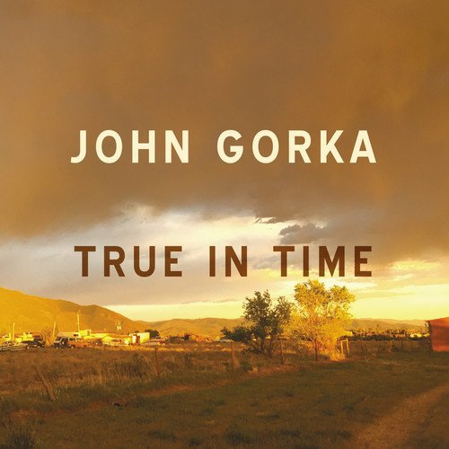 "Album cover with 'John Gorka True In Time' text over a rural landscape at sunset."