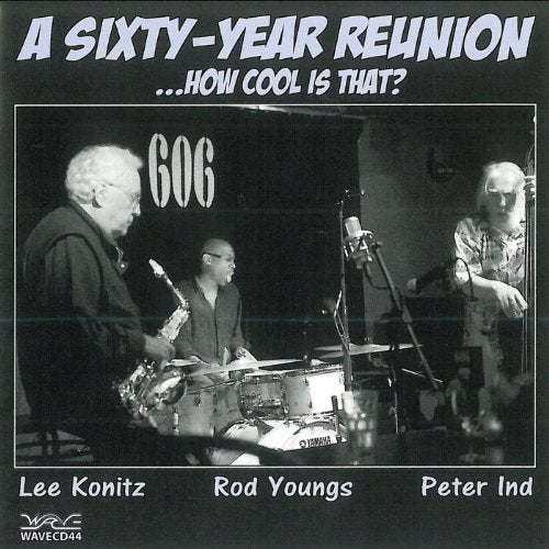 Black and white CD cover featuring three musicians performing on stage together.