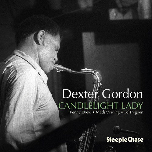 Black and white photo of Dexter Gordon playing the saxophone.