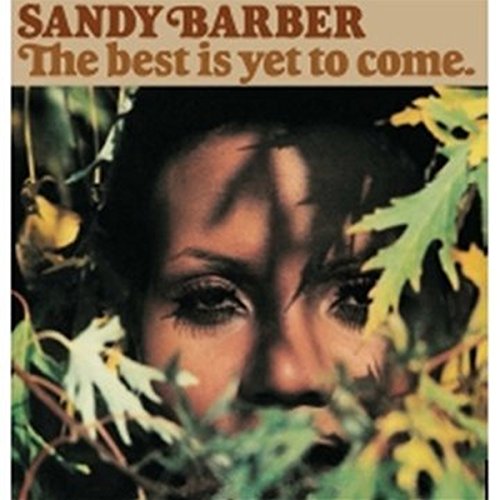 Sandy Barber album cover featuring a woman's face surrounded by green and yellow leaves.