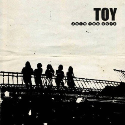 "Black and white album cover with silhouetted figures on a pier, 'TOY' and 'Join The Dots' text."