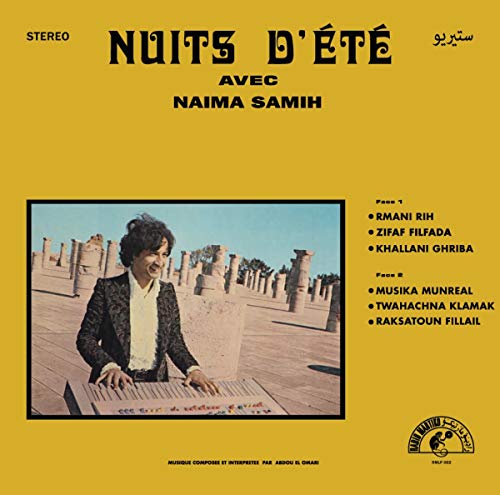 Vinyl record cover featuring a man playing an accordion in a desert landscape.