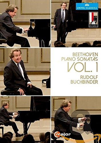 DVD cover featuring pianist Rudolf Buchbinder playing piano in a concert hall.