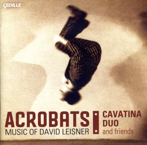 Sepia-toned album cover with a man in mid-air, performing an acrobatic move.