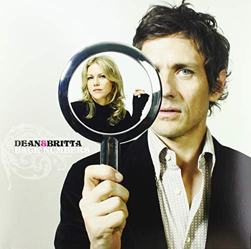 Dean & Britta album cover: man holding a mirror with a woman’s face.