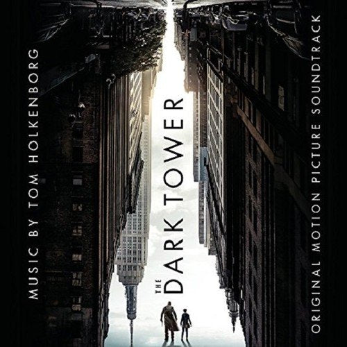 "The Dark Tower" vinyl album cover featuring a dark cityscape with two figures walking.
