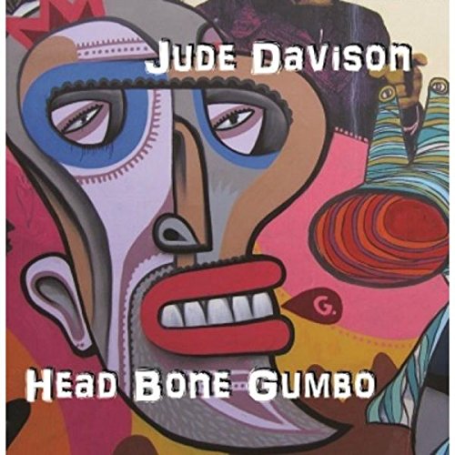 "Album cover art featuring an abstract, colorful face with bold lines and vibrant colors."