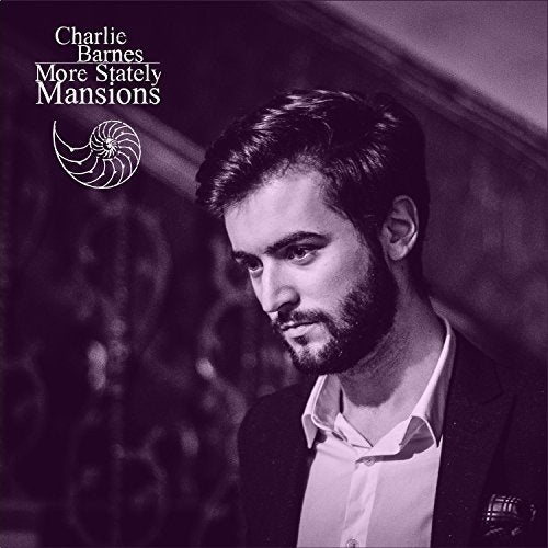CD album cover with a man in a suit, purple-toned image.
