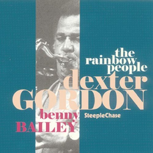 "CD cover with a man playing saxophone, blue background, and artist names."