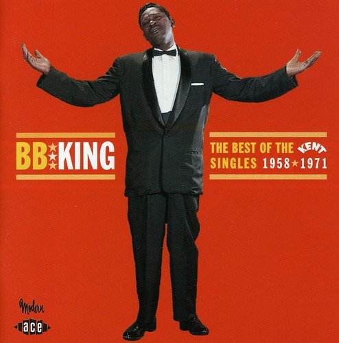 B.B. King album cover featuring a man in a tuxedo against an orange background.