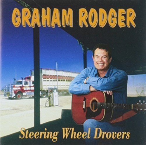 CD cover: Graham Rodger with guitar, truck and gas station backdrop.
