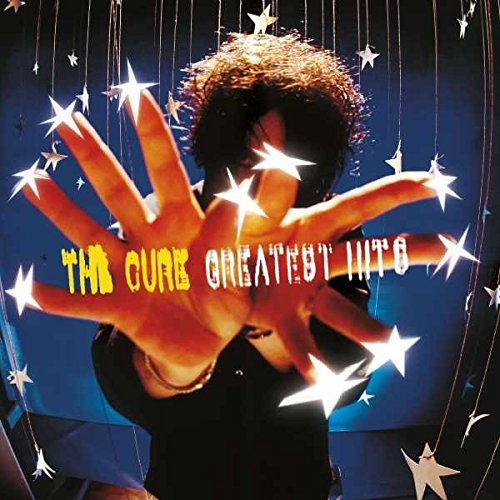 The image shows a vinyl album cover with a person and stars.