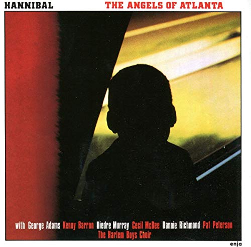 CD cover: Silhouette of a person with headphones, red and gold background.