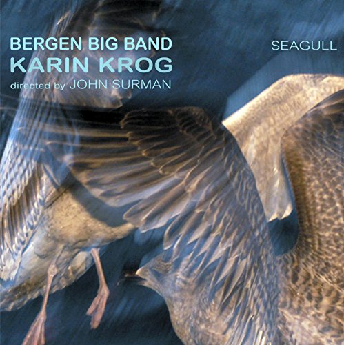 "CD cover with seagulls in flight against a dark blue background, text in top corners."