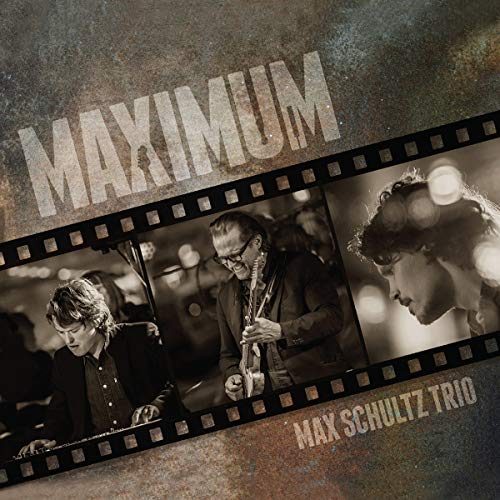 CD cover for Max Schultz Trio’s “Maximum” featuring three musicians.