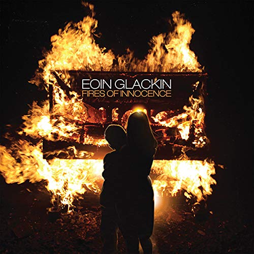 "Album cover: silhouetted figures before a burning wooden structure at night."