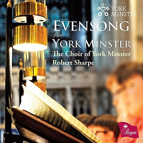 "CD cover featuring a choir boy reading from a hymnal under a lamp."