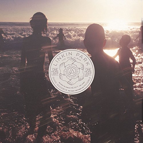 "Album cover with silhouetted figures in water, white circular logo with 'Linkin Park' text."