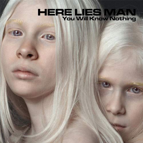 CD cover: two pale people with white hair, facing forward.