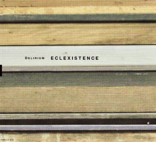 The image is a CD cover for "Delirium - Eclexistence". * The cover features a close-up of horizontal wooden planks in various shades of brown and gray. * The title "DELIRIUM ECLEXISTENCE" is displayed prominently in black text on a white plank. * A small black rectangle is visible on the left side of the image, partially obscuring the left edge of the white plank. * In the bottom-left corner, the text "DOMCD 210