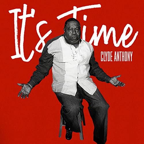 CD cover featuring Clyde Anthony in a suit, mid-performance.
