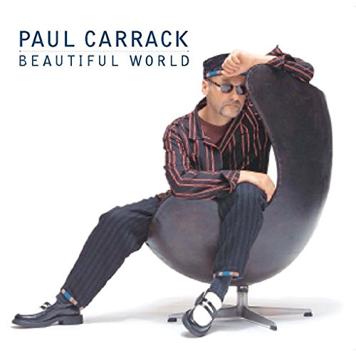 Album cover of "Beautiful World" by Paul Carrack, man sitting on a chair.