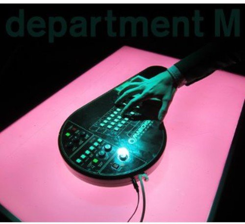 A hand operates a glowing DJ controller on a pink-lit surface.