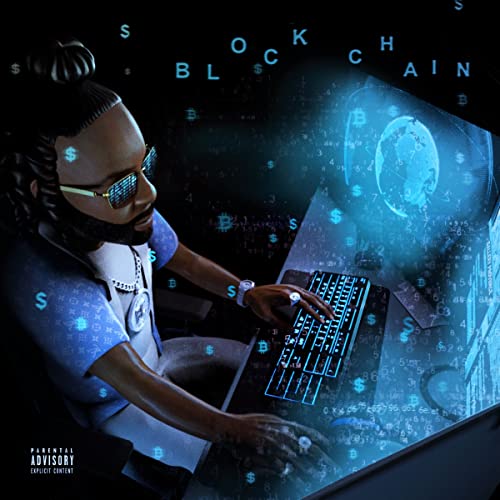 Man with sunglasses typing at a computer with digital currency imagery.