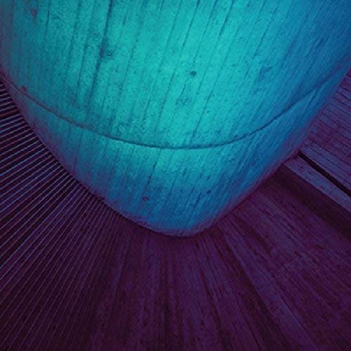 Abstract blue and purple textured cylinder on a lined surface.