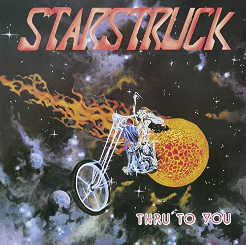 Album cover: motorcycle riding through space toward a large sun.