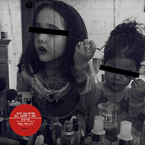 Black and white photo of two young children with obscured eyes.