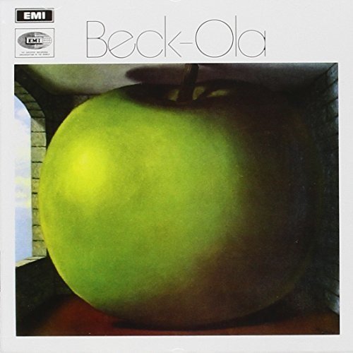 Album cover featuring a green apple in a brick box.
